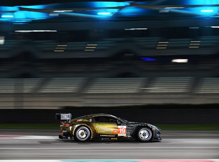 Blackthorn Racing Aston Martin GT3 at night, sponsored by Lionscrest Advisors